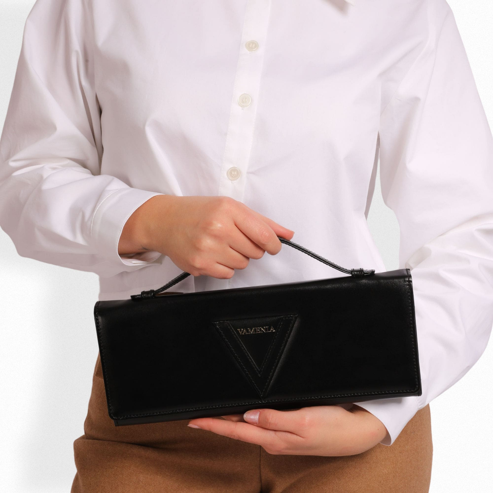 Long clutch made of calf leather in black